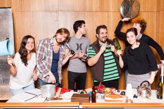 Cast members experiment with sound at the Foley desk during rehearsals for the upcoming 1930s radio opera at the Sydney Conservatorium of Music. Photo: Louis Dillon Savage.  