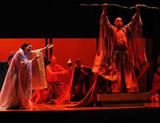 Alexia Vougaridou (Cio-Cio-San) and Jud Arthur (the Bonze) in Opera Australia's Madama Butterfly (2015). Photo credit Branco Gaica.