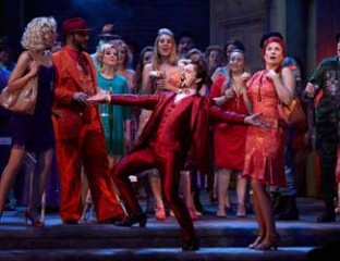 Margaret Trubiano (Mercédès), Michael Honeyman (Escamillo) and Jane Ede (Frasquita) in Opera Australia's production of Carmen.  Photo credit: Keith Saunders