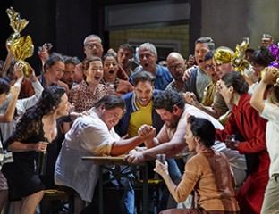 Sian Pendry as Lola, Diego Torre as Turridu, Samuel Dundas as Silvio and the Opera Australia Chorus in Cavalleria Rusticana. Photo credit: Keith Saunders.